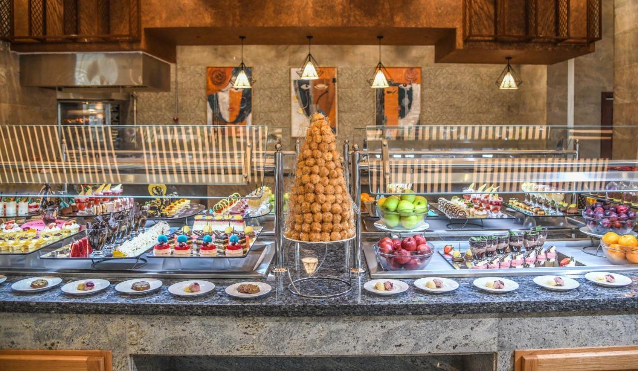 Tolip Resort El Galala Hills Ain Sukhna Exterior photo A buffet at a hotel