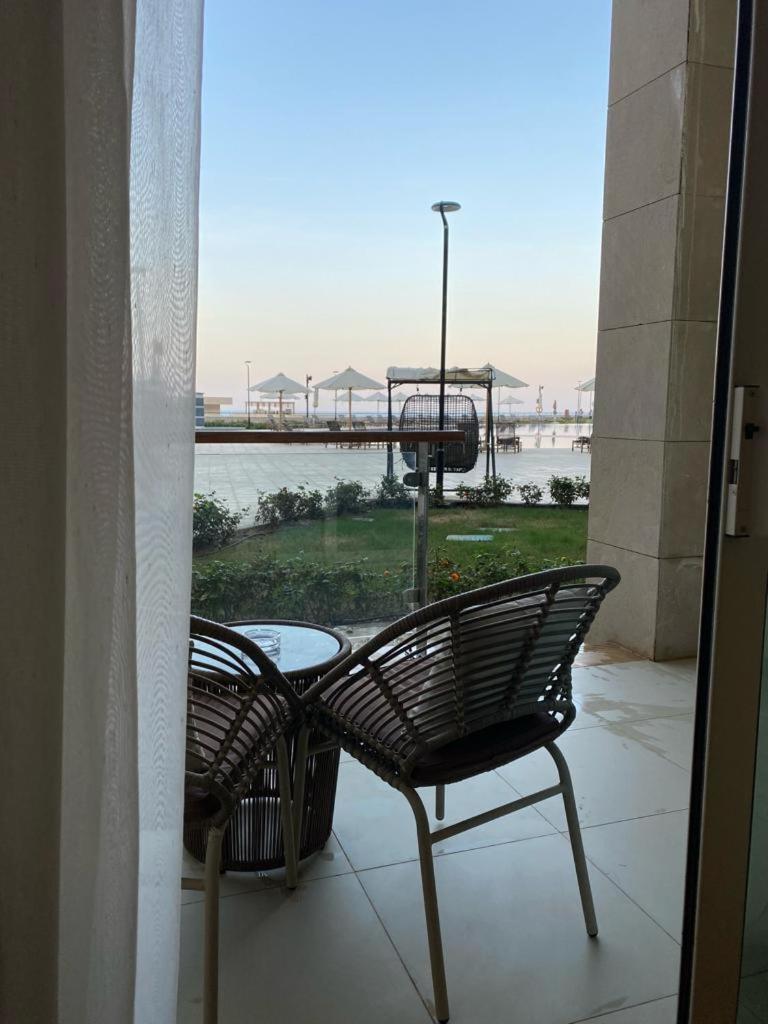 Tolip Resort El Galala Hills Ain Sukhna Exterior photo View of the hotel's pool